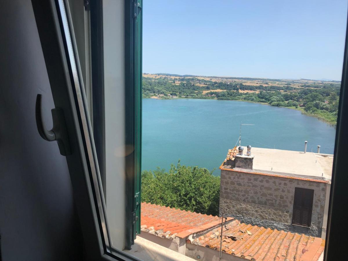 Attico Con Vista Lago - Miralago 앙귈라라사바치아 외부 사진