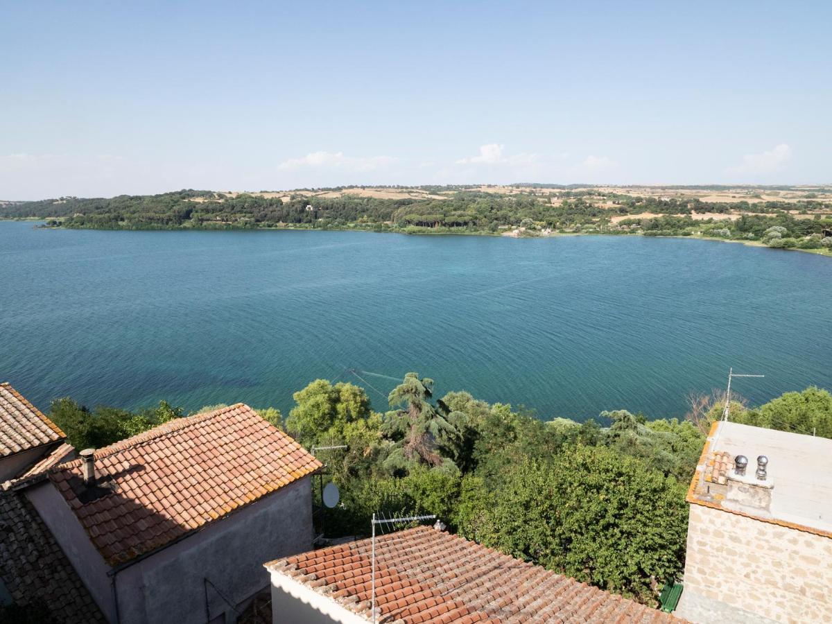 Attico Con Vista Lago - Miralago 앙귈라라사바치아 외부 사진