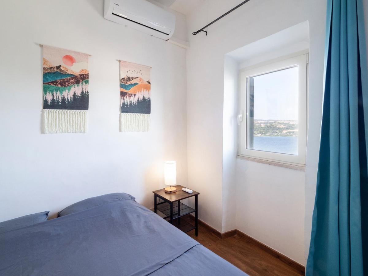 Attico Con Vista Lago - Miralago 앙귈라라사바치아 외부 사진